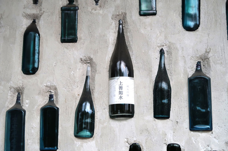 Recycled bottles on wall