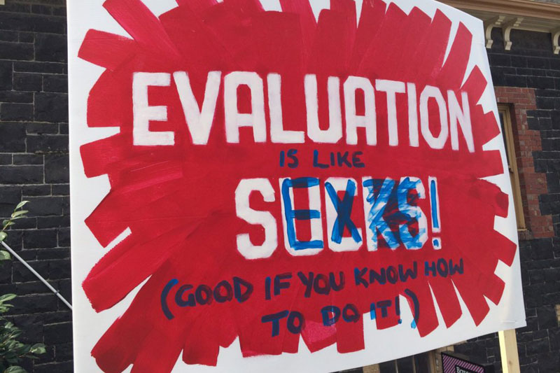 Signboard with text reading Evaluation is like sex good if you know how to do it