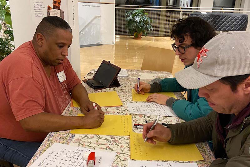 Photo of Runes Writing Workshop at the opening reception of Words of Support, Star Store Campus, Centre for Visual & Performing Arts, University of Massachusetts Dartmouth, USA, 2020