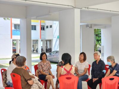 Artswok Both Sides, Now Yishun Seniors Conversations with artist Salty Xie facing a group of seniors sitting around at void desk